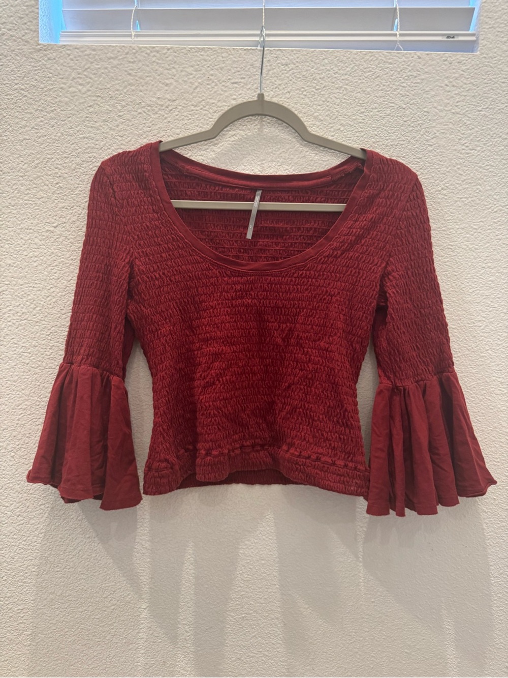 Anthropologie smocked bell-sleeve top with a scoop neckline & textured shirring